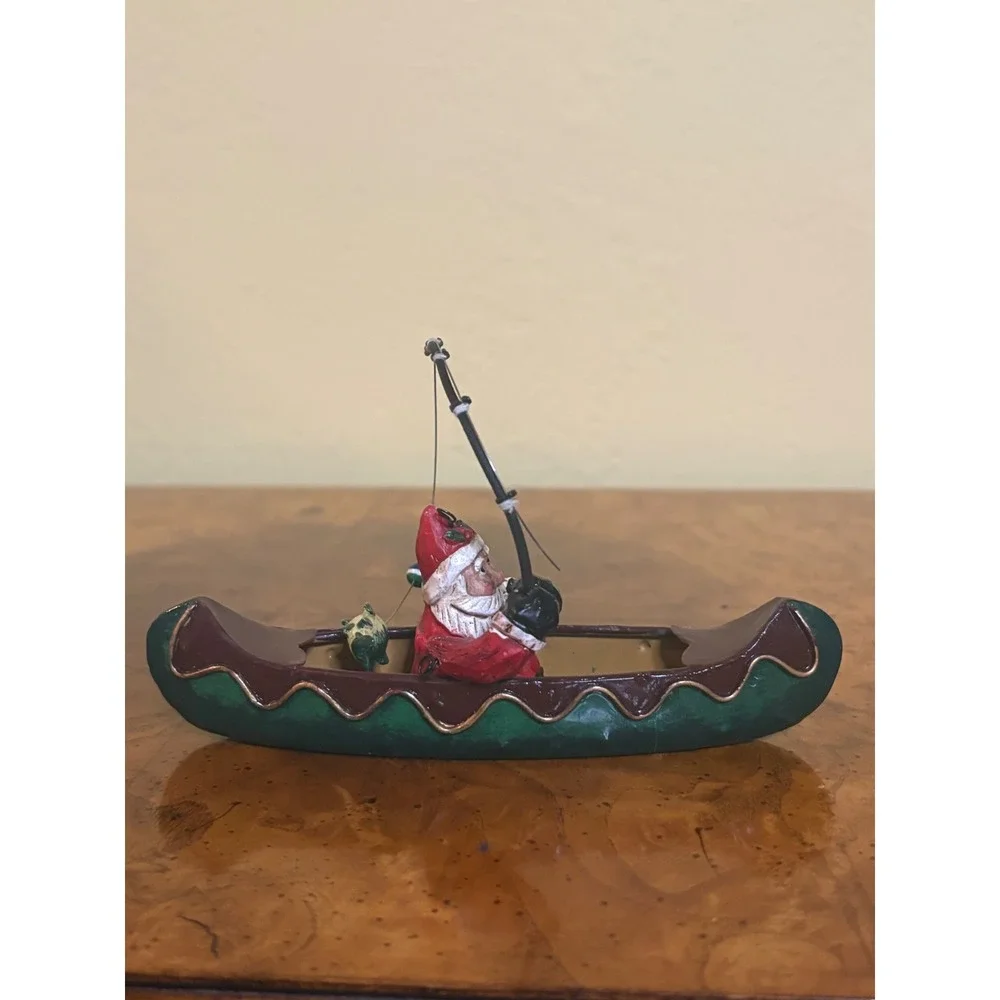 Vintage Santa in Canoe Fishing Figurine Christmas Holiday Decor Rustic Cabin